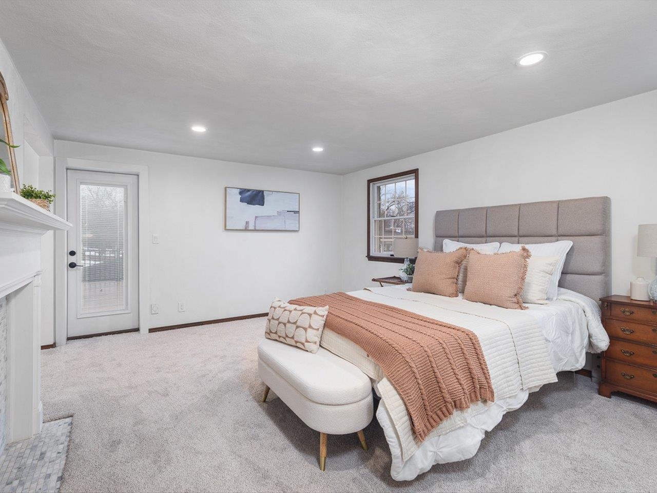 1927 Baintree Road Lake Summerset, IL 61019 - Photo 32 of 71 a spacious bedroom with a bed and a couch