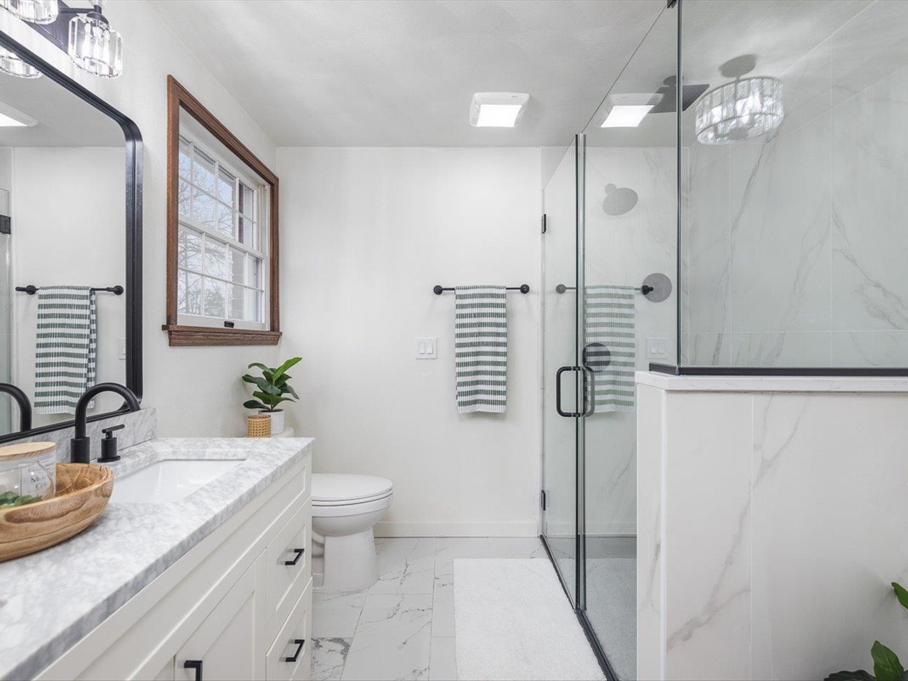 1927 Baintree Road Lake Summerset, IL 61019 - Photo 35 of 71 a bathroom with a granite countertop sink a toilet a shower and a mirror