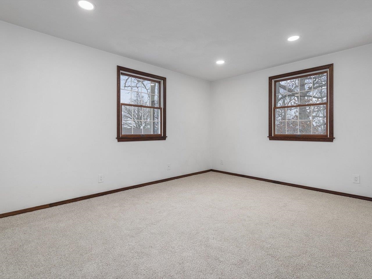 1927 Baintree Road Lake Summerset, IL 61019 - Photo 43 of 71 an empty room with windows and closet