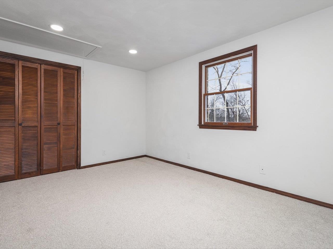 1927 Baintree Road Lake Summerset, IL 61019 - Photo 44 of 71 an empty room with windows