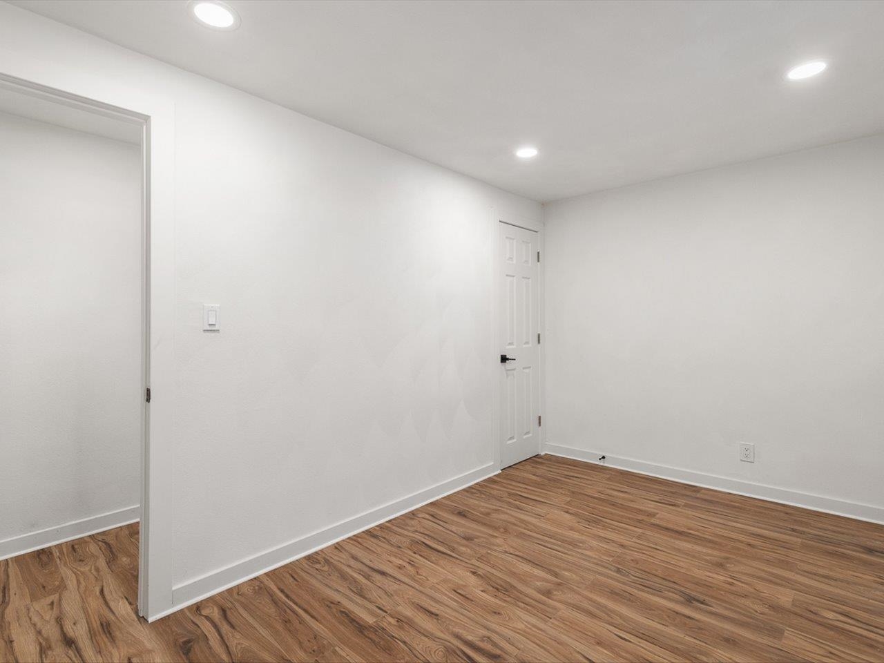 1927 Baintree Road Lake Summerset, IL 61019 - Photo 52 of 71 a view of empty room with wooden floor