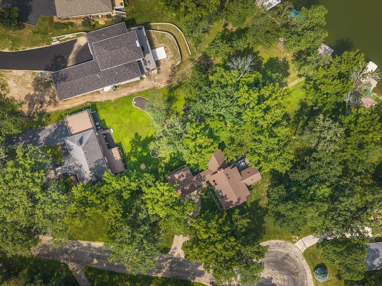 1927 Baintree Road Lake Summerset, IL 61019 - Photo 63 of 71 an aerial view of a house with a yard and swimming pool