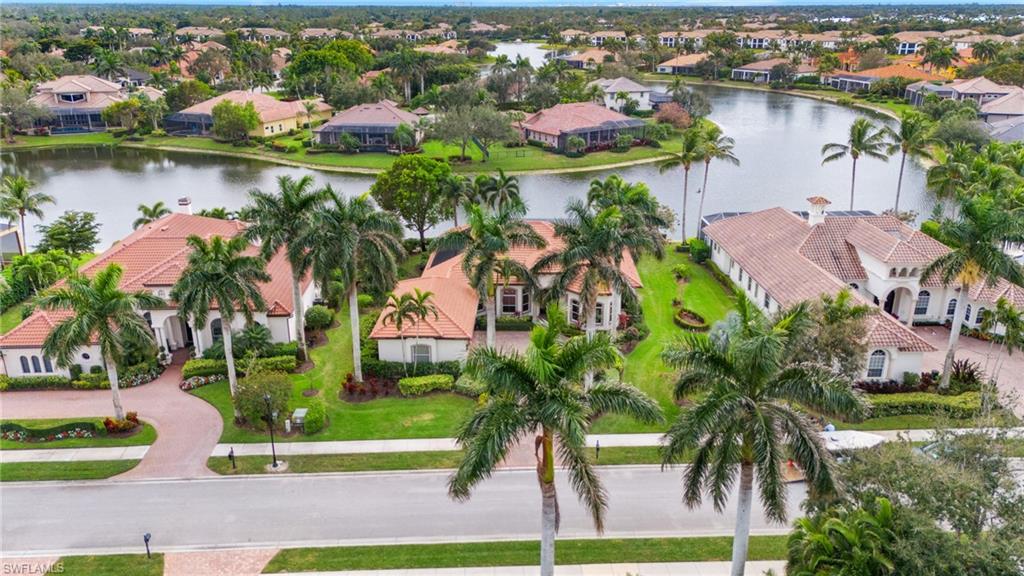 7833 Classics Drive Naples, FL 34113 - Photo 2 of 43 Aerial view with a water view