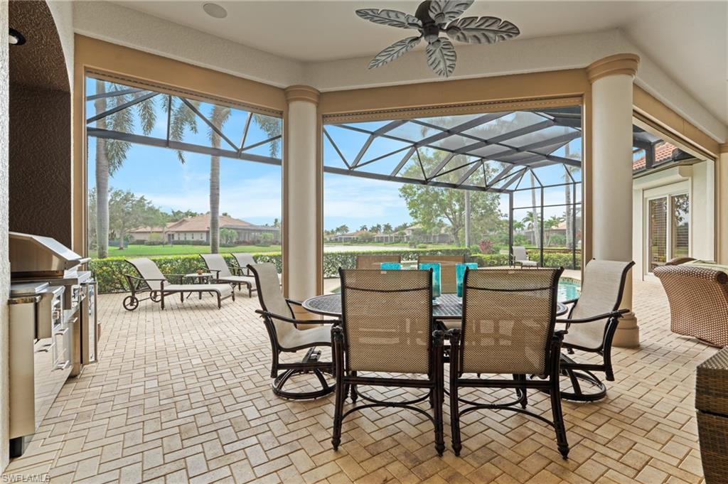 7833 Classics Drive Naples, FL 34113 - Photo 35 of 43 Sunroom featuring ceiling fan