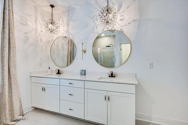 a bedroom with a bed and ceiling fan