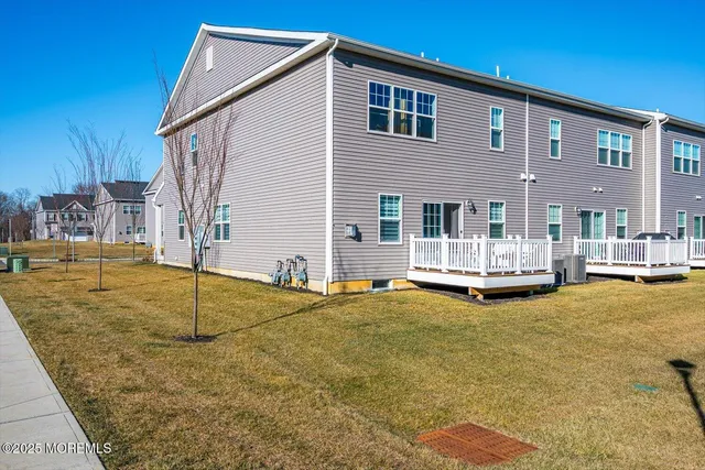 a view of outdoor space with signage and flags