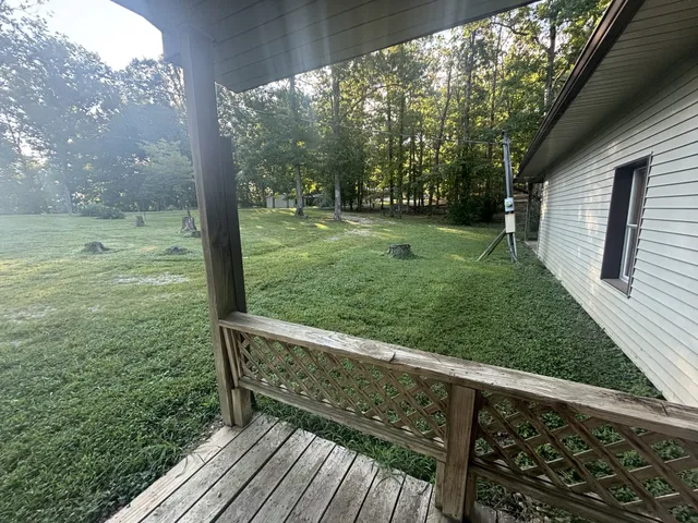 a view of balcony with deck