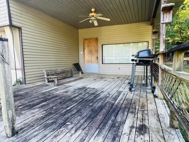 a view of a couches with wooden floor