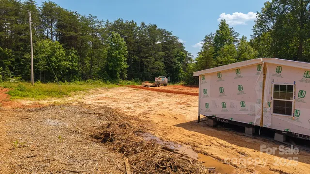 a view of a back yard of the house