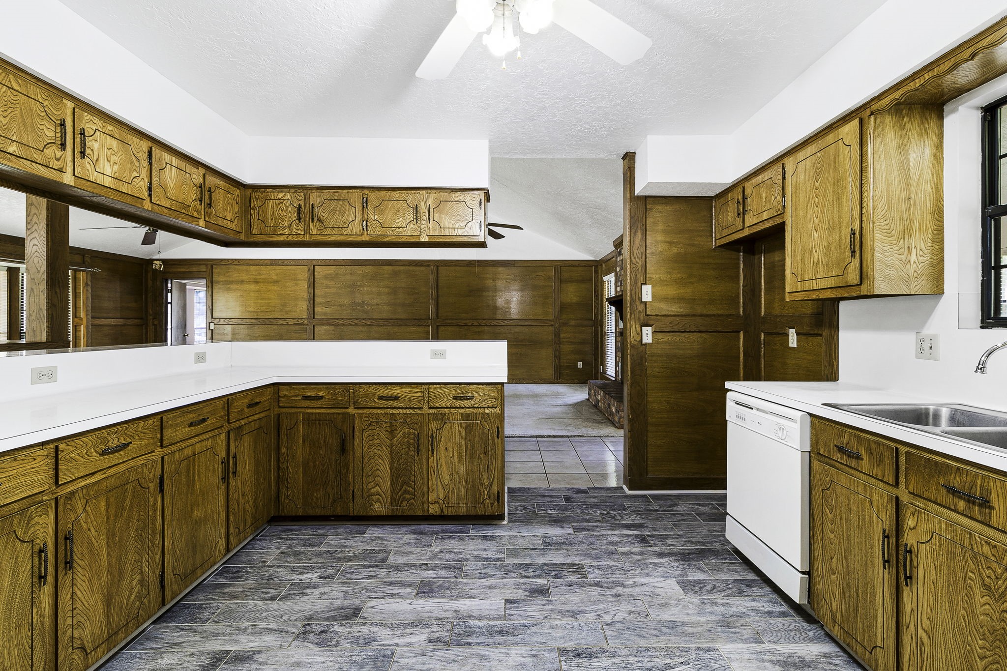 13180 Morgan Drive Splendora, TX 77372 - Photo 14 of 34 a kitchen with stainless steel appliances granite countertop a stove a sink and a refrigerator