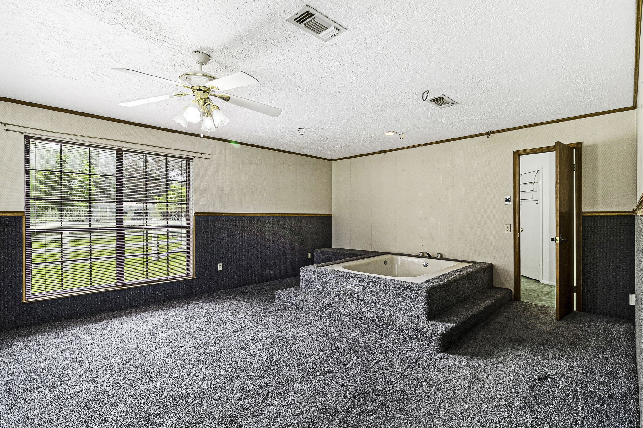 13180 Morgan Drive Splendora, TX 77372 - Photo 19 of 34 a view of an empty room with a window