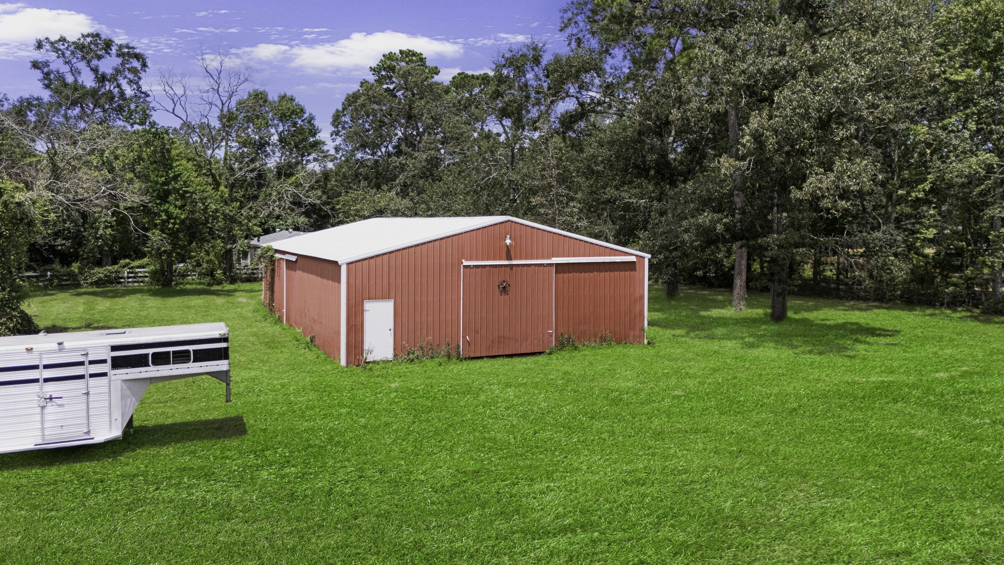 13180 Morgan Drive Splendora, TX 77372 - Photo 25 of 34 a view of a backyard with a garden and entertaining space