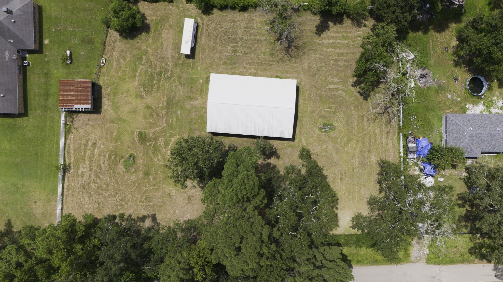 13180 Morgan Drive Splendora, TX 77372 - Photo 31 of 34 an aerial view of a house with a yard