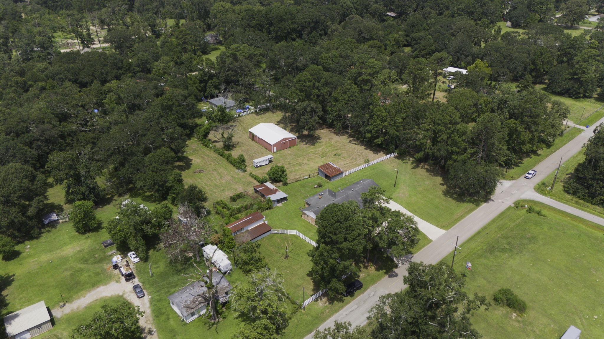 13180 Morgan Drive Splendora, TX 77372 - Photo 33 of 34 an aerial view of a house with a yard