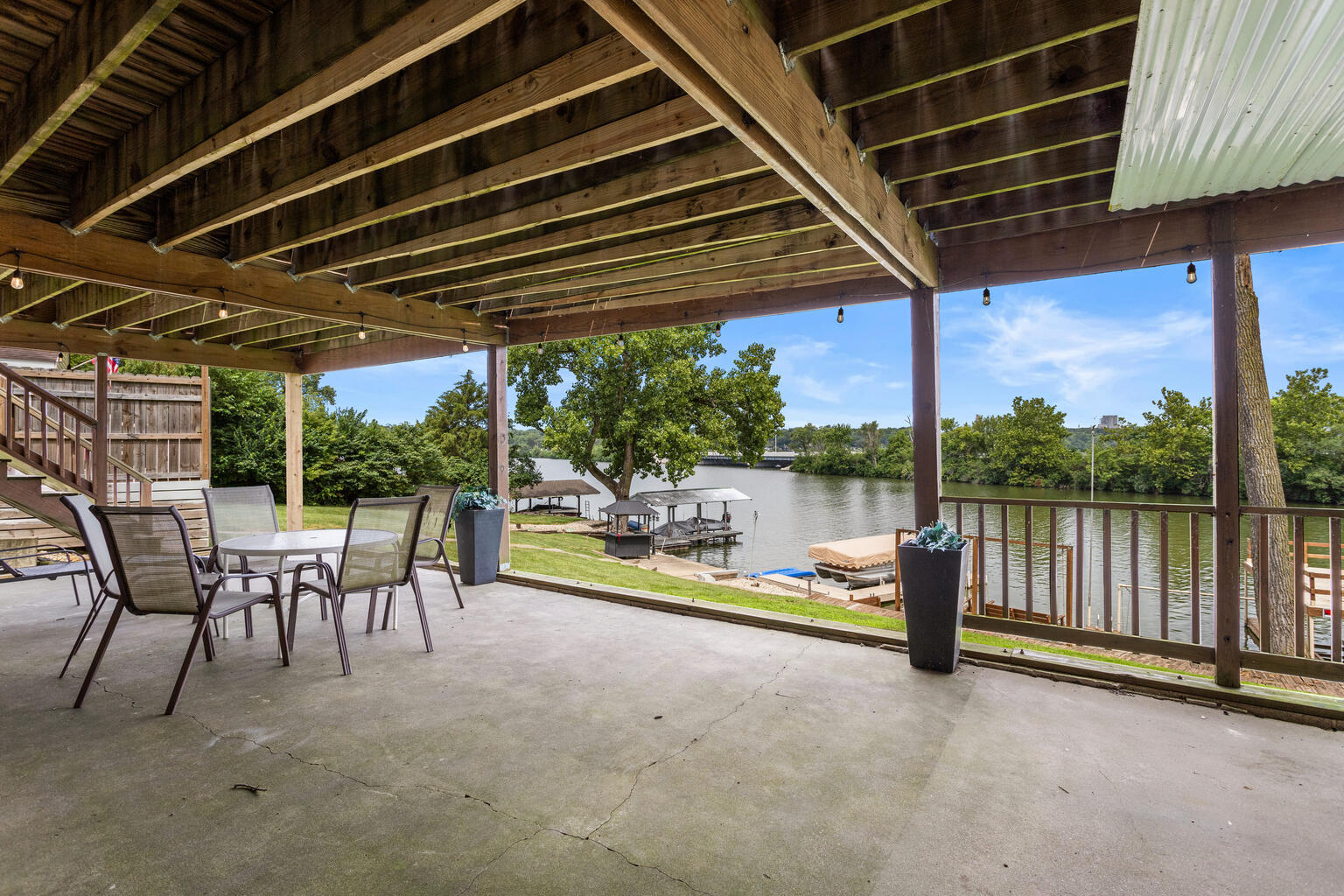 690 North Cove Court Decatur, IL 62521 - Photo 11 of 50 a view of a porch with furniture and a backyard