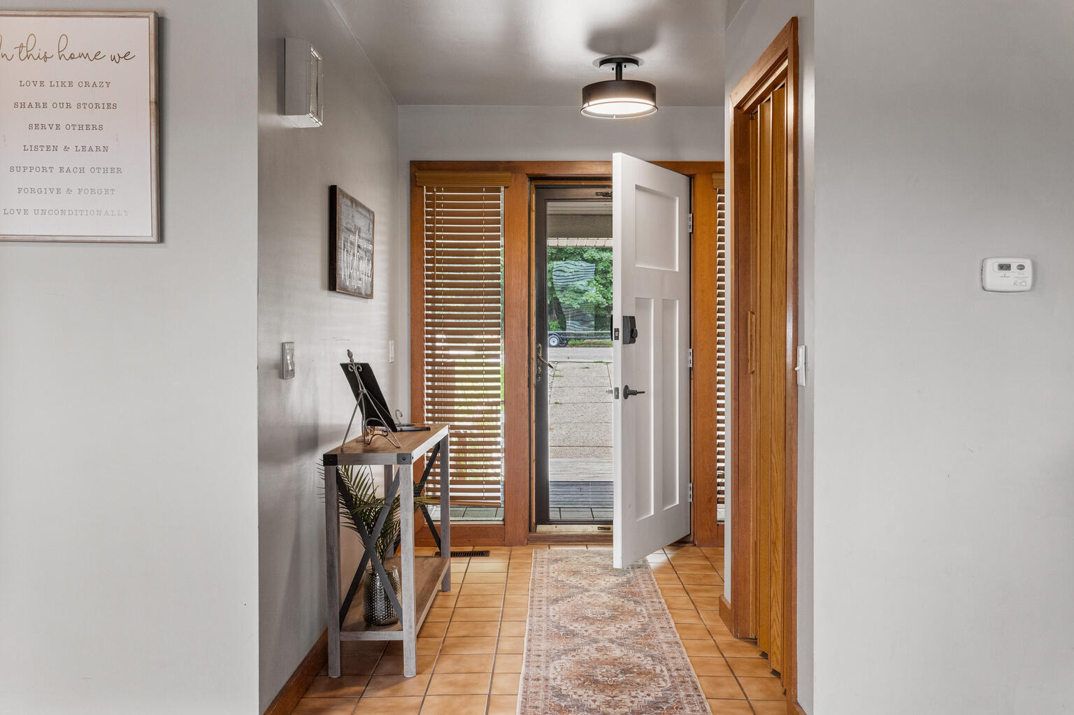 690 North Cove Court Decatur, IL 62521 - Photo 14 of 50 a view of a hallway with furniture and windows