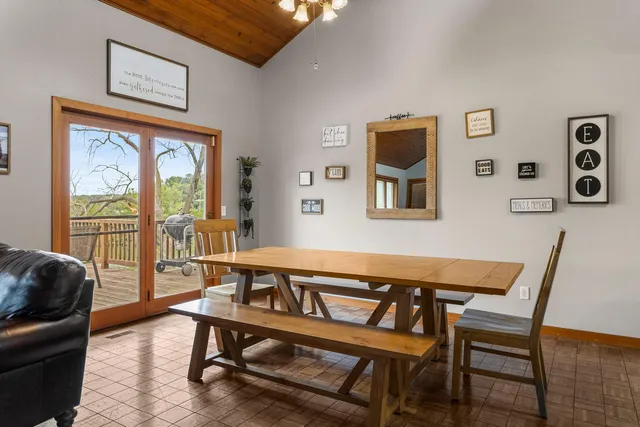 a view of a livingroom with furniture and a window