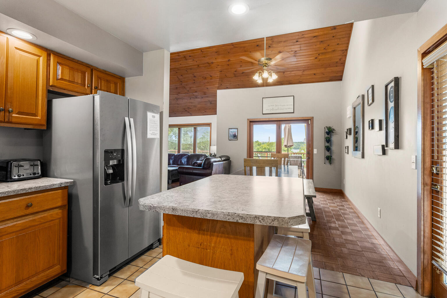 690 North Cove Court Decatur, IL 62521 - Photo 21 of 50 a kitchen with stainless steel appliances granite countertop a refrigerator and a stove top oven