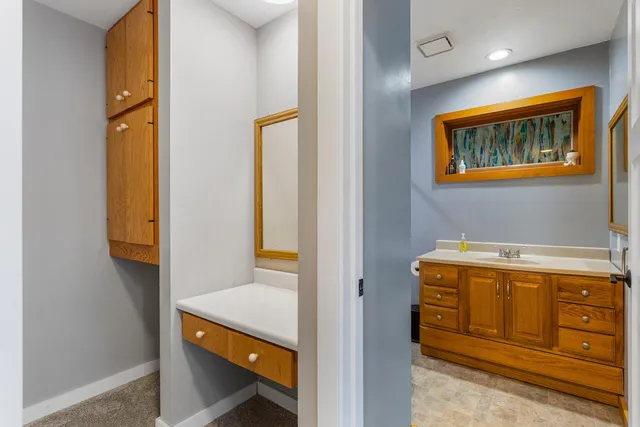 a view of an entryway with a bed