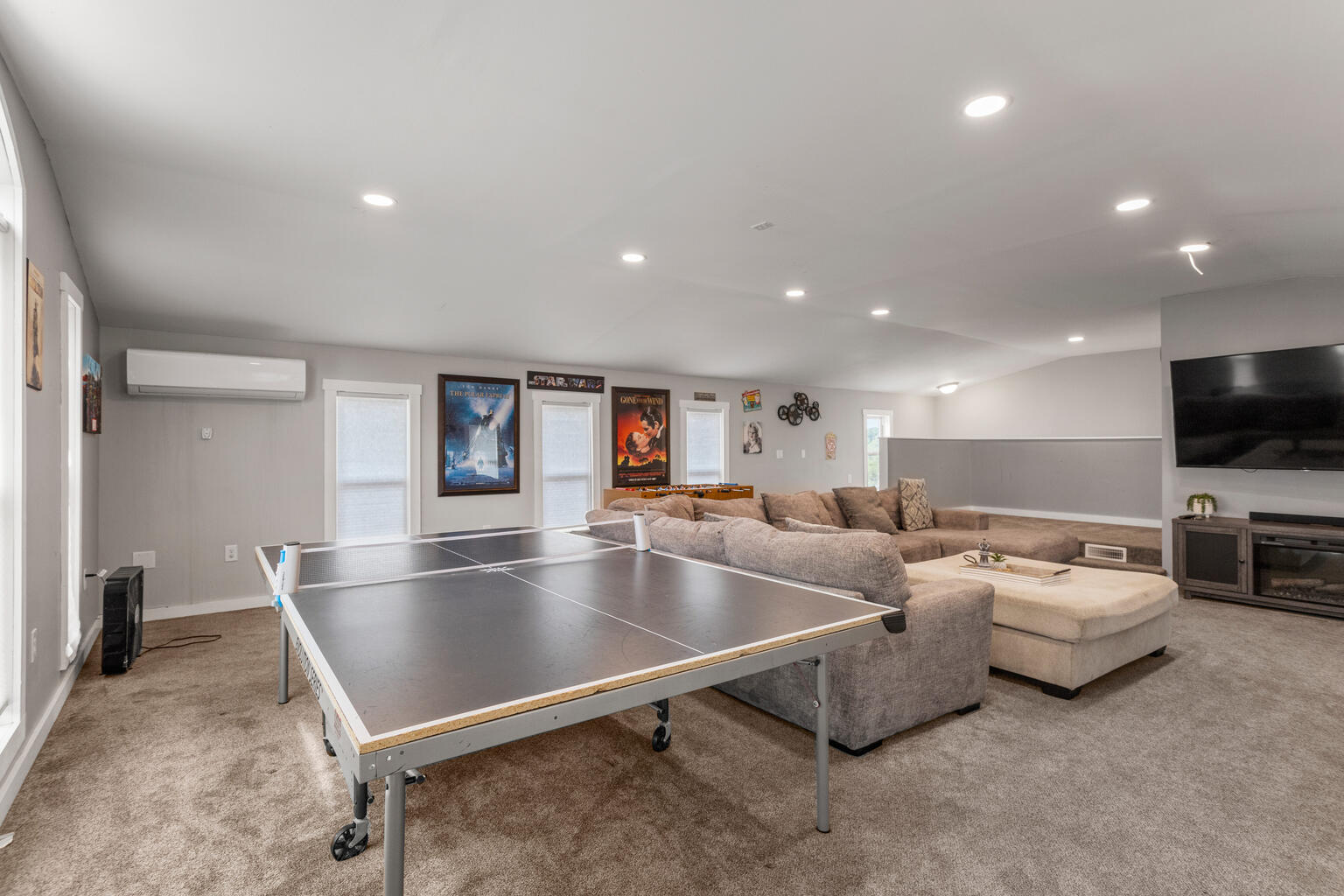 690 North Cove Court Decatur, IL 62521 - Photo 33 of 50 a living room with furniture and a flat screen tv
