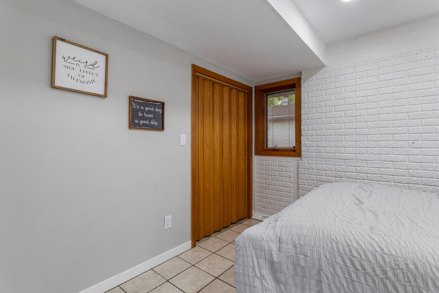 690 North Cove Court Decatur, IL 62521 - Photo 46 of 50 a bedroom with a bed and a wall painting
