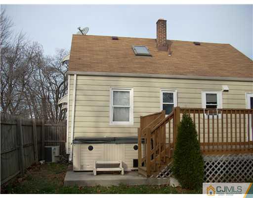 183 Old Post Road Edison, NJ 08817 - Photo 2 of 8 a front view of a house with a garage