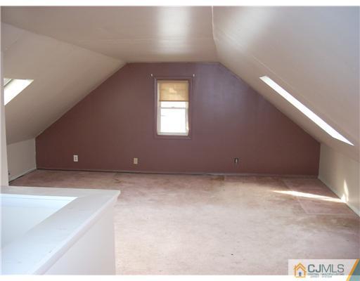 183 Old Post Road Edison, NJ 08817 - Photo 5 of 8 a view of an empty room