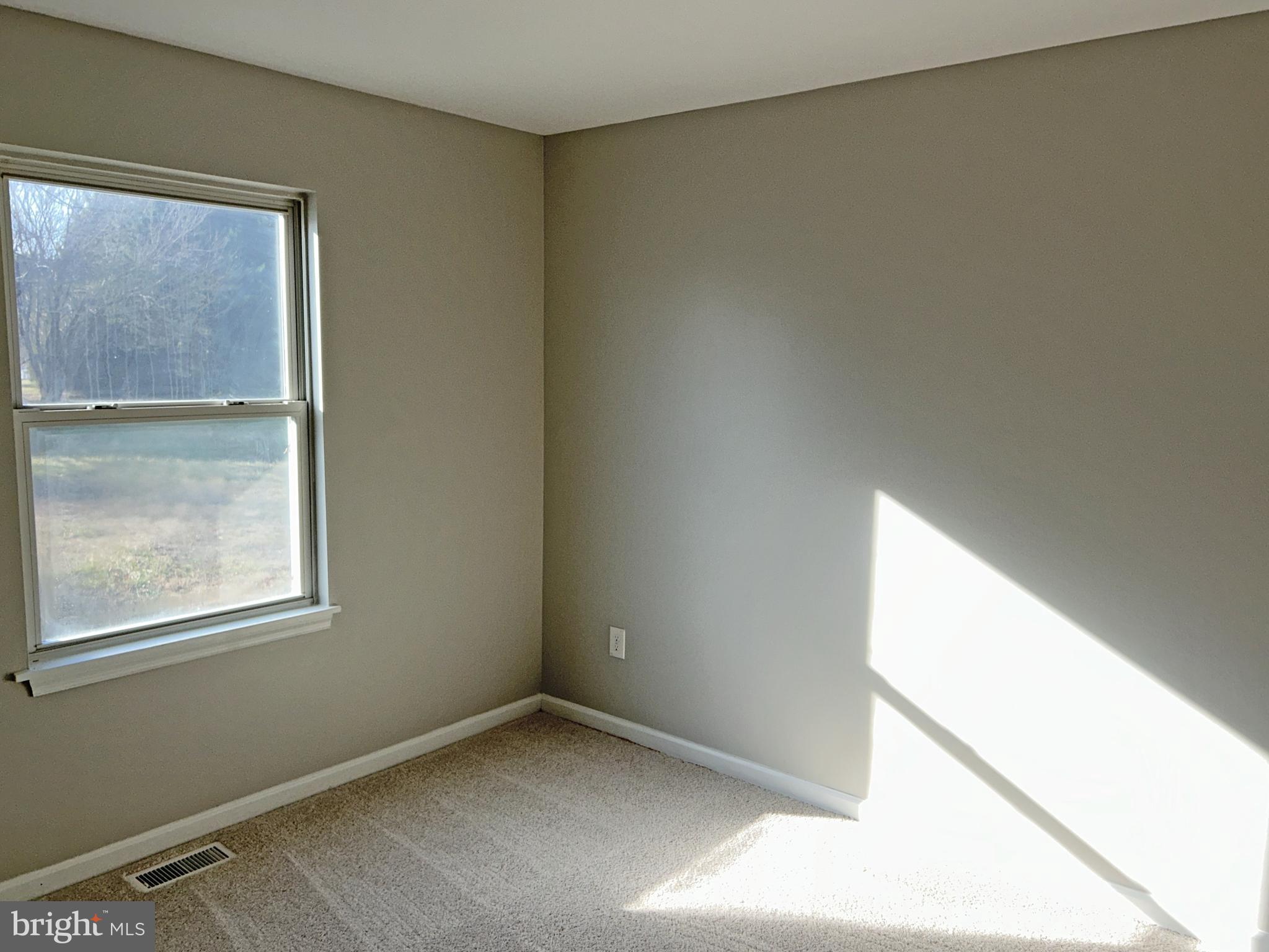 21630 Hackney Circle Lincoln, DE 19960 - Photo 7 of 13 a view of an empty room and window
