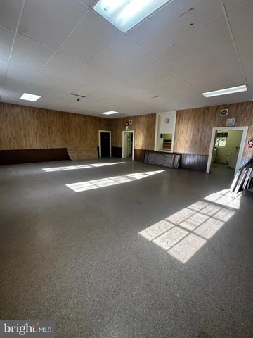 a view of a livingroom with furniture and window