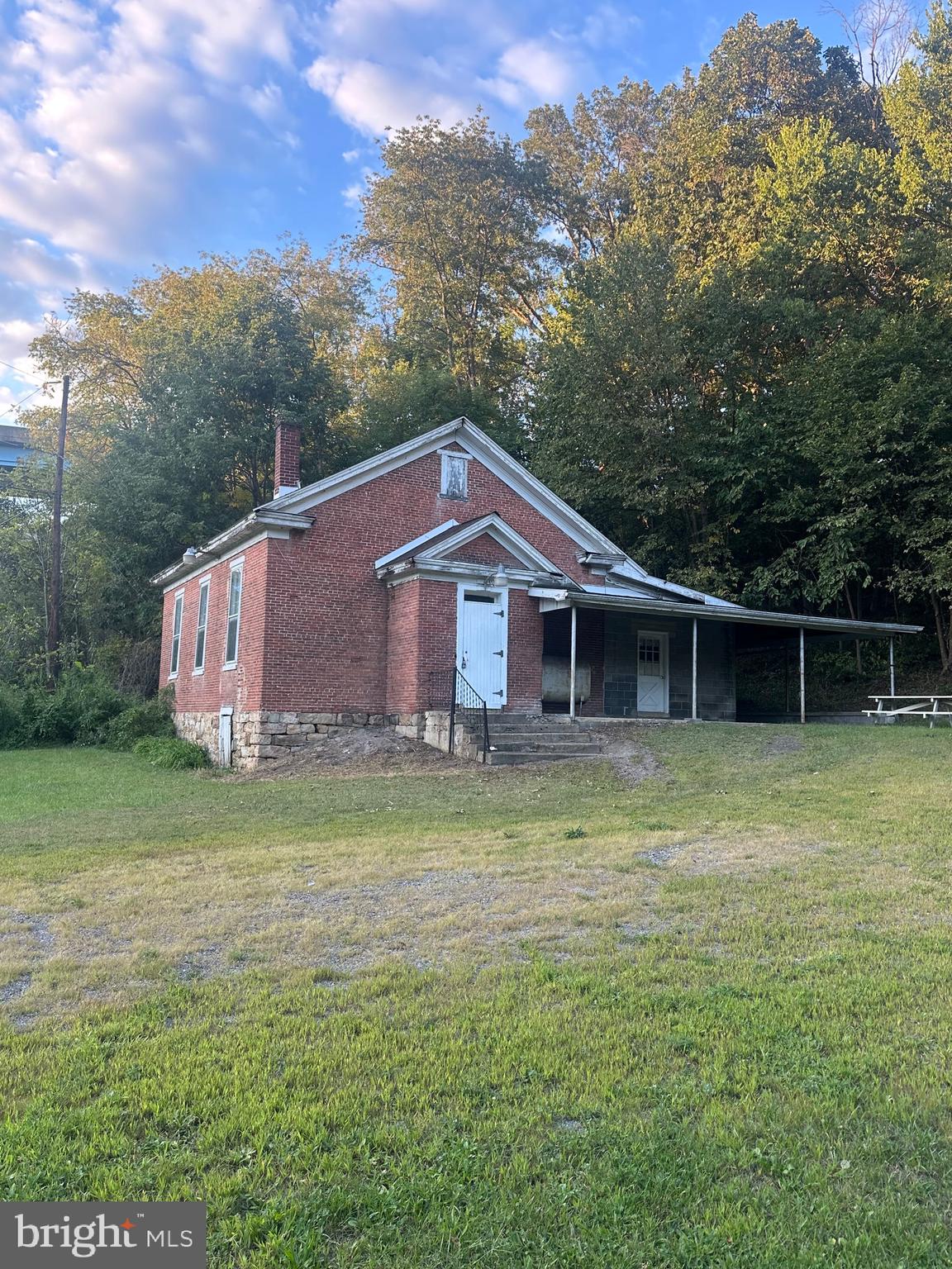 320 Locust Run Road Thompsontown, PA 17094 - Photo 2 of 29 a house view with a garden space