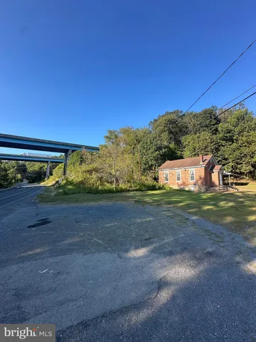 a view of balcony with furniture