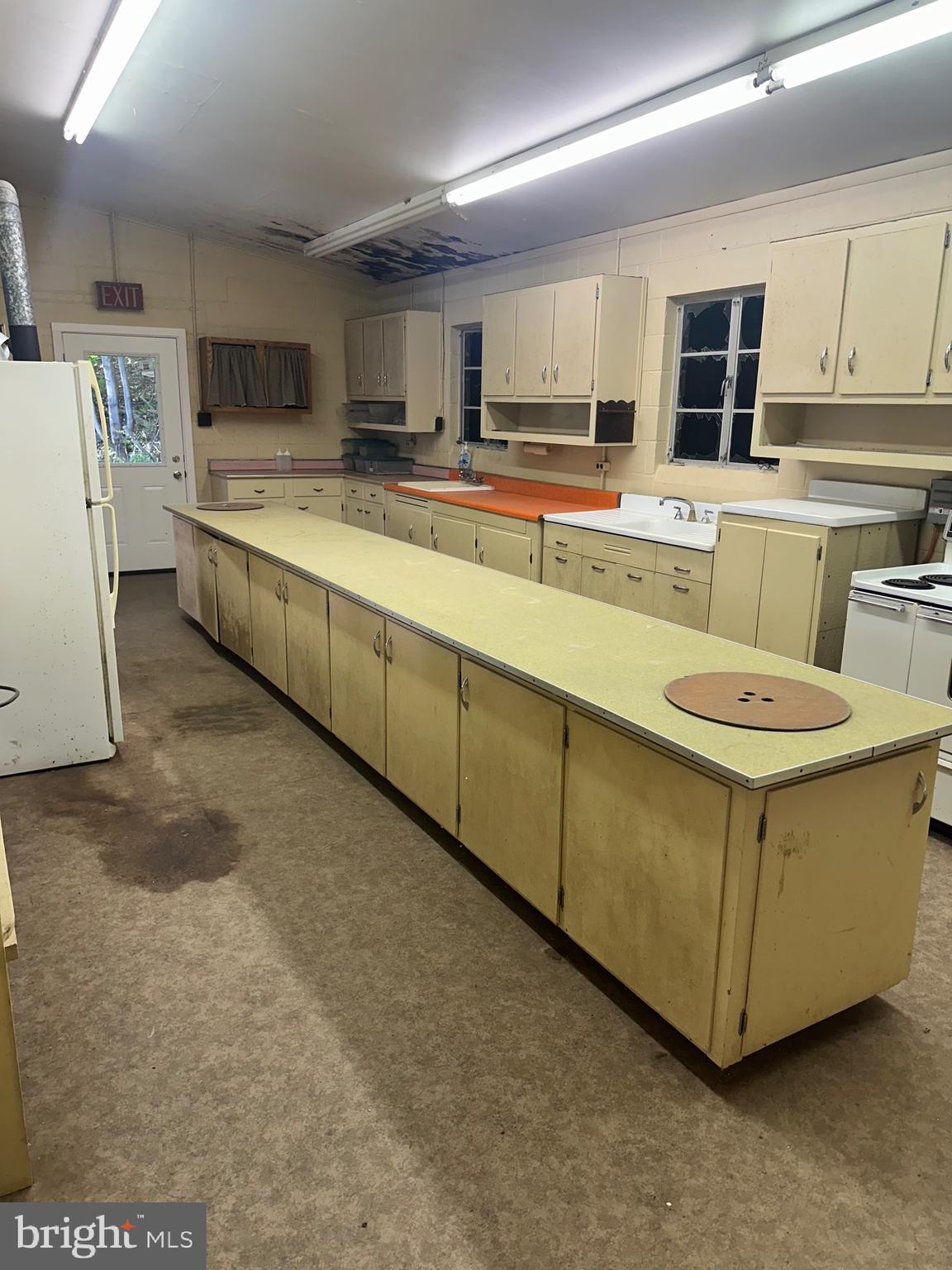 320 Locust Run Road Thompsontown, PA 17094 - Photo 10 of 29 a kitchen with stainless steel appliances a stove a sink a refrigerator a microwave and cabinets