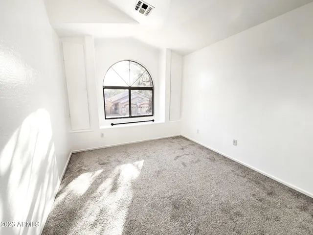 a view of a room with an empty space