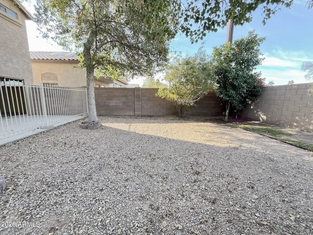 a street sign on the side of building