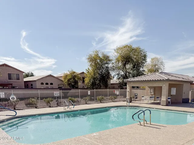 a view of a car park in front of building