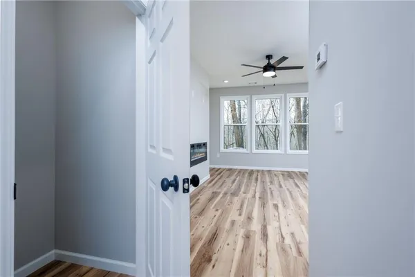 a view of hallway with windows
