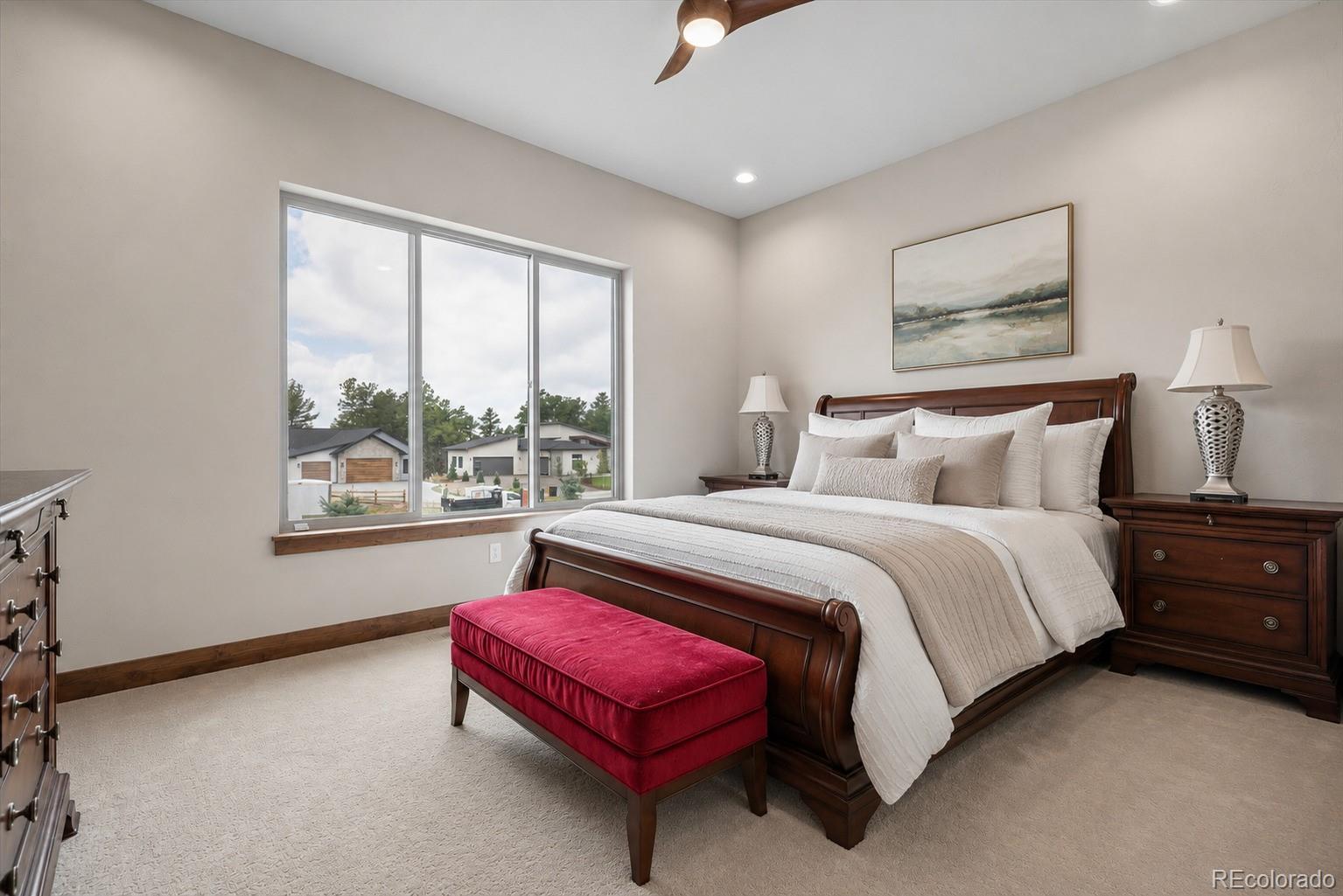 5754 Powell Road Parker, CO 80134 - Photo 26 of 43 a bedroom with a bed and window