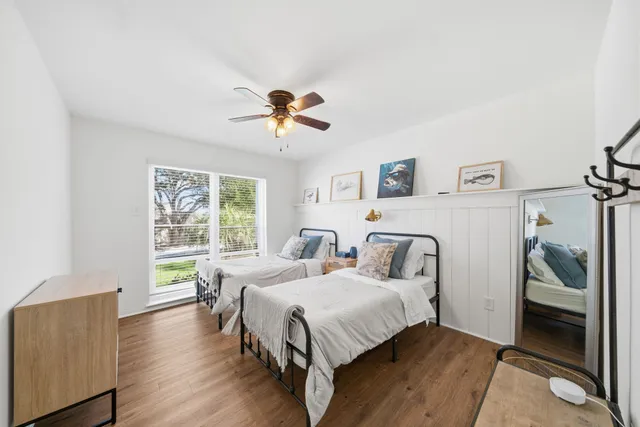 a bedroom with a bed and a table