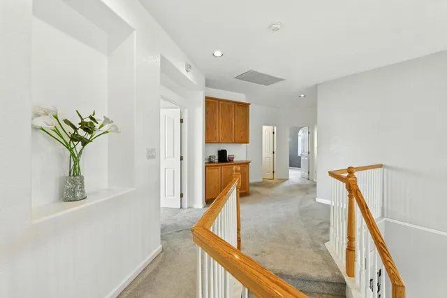 a view of kitchen with furniture and wooden floor