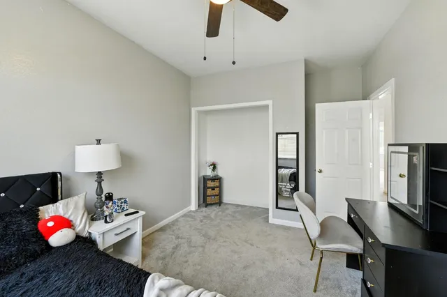 a open kitchen with cabinets and wooden floor