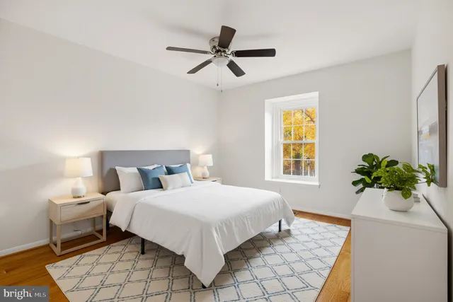 a bathroom with a sink toilet tub and shower