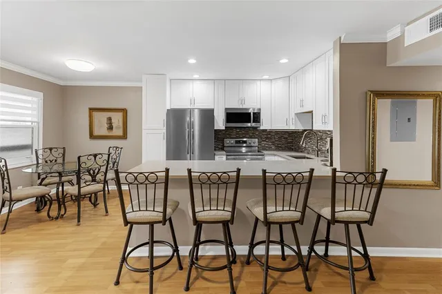 a view of a dining room with furniture