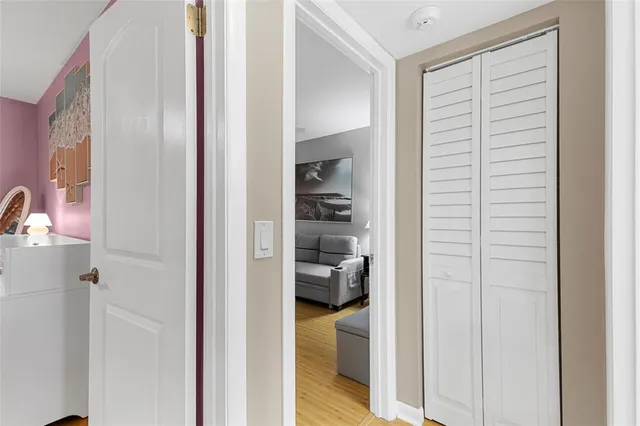 a view of a bedroom from a hallway