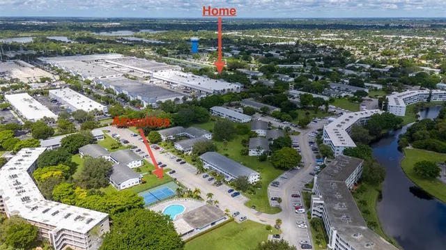 an aerial view of residential house with outdoor space