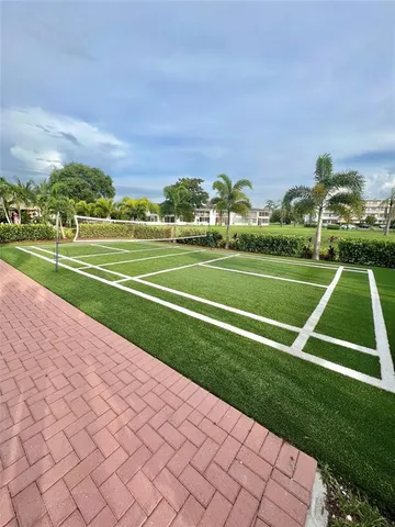 a view of an outdoor space and tennis court