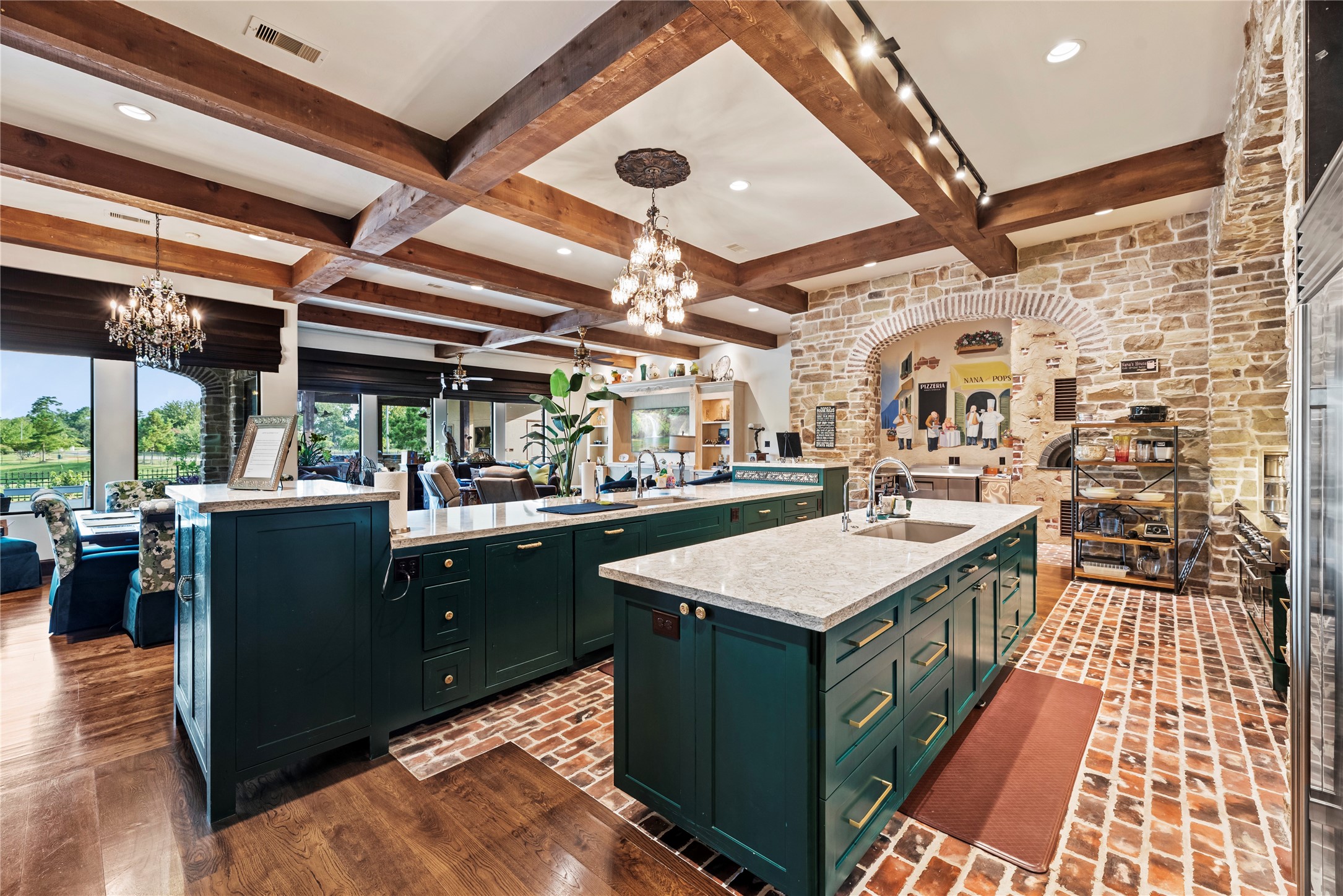 7715 Firethorne Creek Court Spring, TX 77389 - Photo 18 of 50 a large kitchen with a stove and a clock
