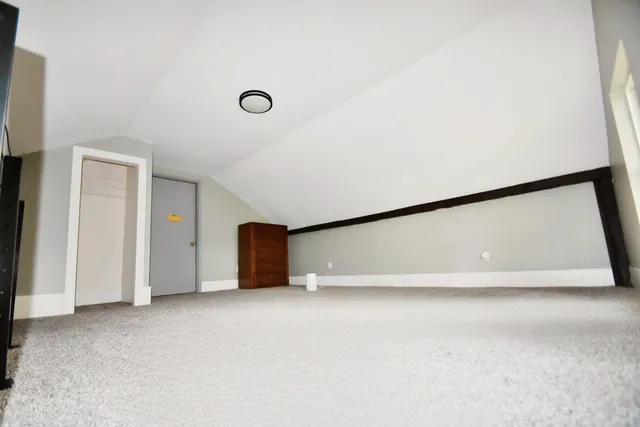 a hallway with a wooden floor