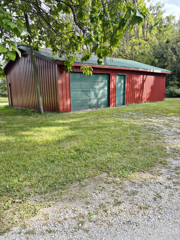 a view of outdoor space with a tree