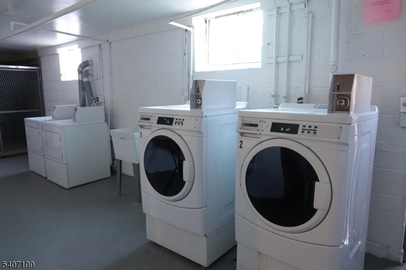 2467 Highway 10, Unit 3B Morris Plains, NJ 07950 - Photo 18 of 22 a utility room with dryer and washer