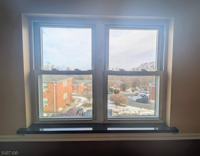 2467 Highway 10, Unit 3B Morris Plains, NJ 07950 - Photo 10 of 22 a view of a room that has a window